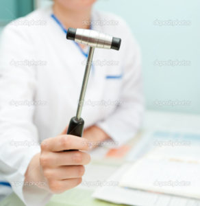 a doctor neuropathologist shows a reflex hammer to camera